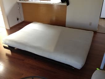 Tan futon with solid wood frame $220 2
