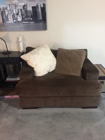 2 identical brown love seats/oversized chairs. Perfect condition. 1