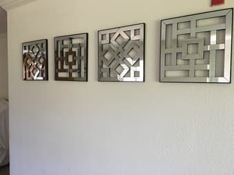 Four unique and beautiful wall mirrors with square cutouts 1