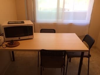 dinning table (w 4 chairs), microwave oven 1