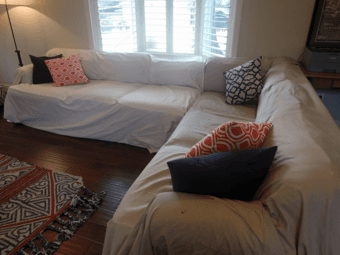 L-shaped couch with Crate & Barrel covers 2