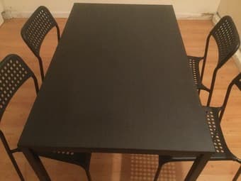 A nice table with four chairs for study or dinning 1