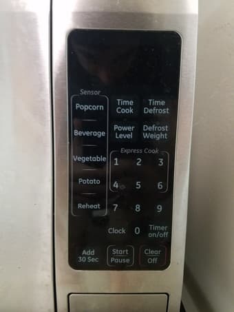 GE 1.6 Cu. Ft. Countertop Microwave Oven 3