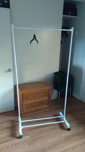 plastic clothes rack($3); Ikea Octopus hangers ($1); Ikea floor mats 1