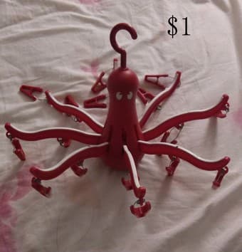 plastic clothes rack($3); Ikea Octopus hangers ($1); Ikea floor mats 2