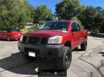 Red Nissan Titan 2006 XE King Cab 4x2 1