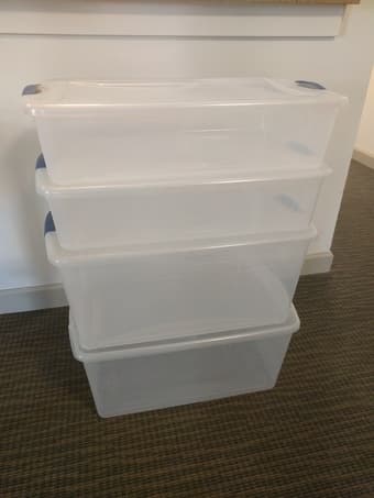 Four large Sterilite storage bins 1