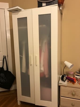 White Ikea closet and a night stand 1