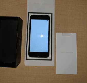 Mint Condition Unlocked iPhone 7 (128 GB) in Jet Black + Spigen Case 1