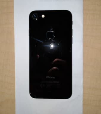 Mint Condition Unlocked iPhone 7 (128 GB) in Jet Black + Spigen Case 3