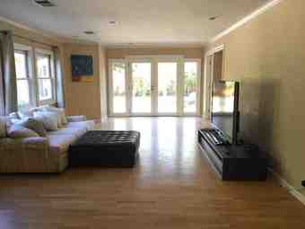 Sun-drizzled bedroom with private bathroom in charming shared abode 2
