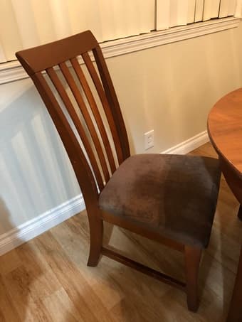 Wooden round dining table with 4 cushioned chairs 3