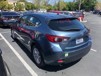 2015 Mazda 3 (blue) 1