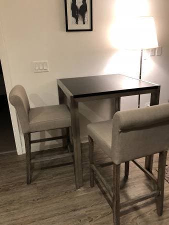 Desk, tv stand, counter-height table and linen chairs 1