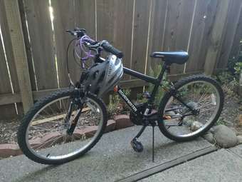 Almost new bike + helmet + lock 1