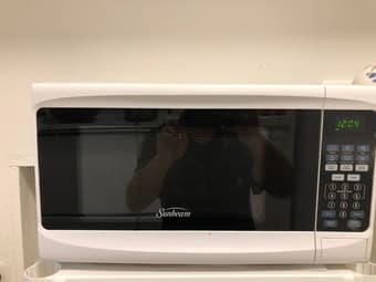 Moving Sale!  Sunbeam Microwave with frame 2