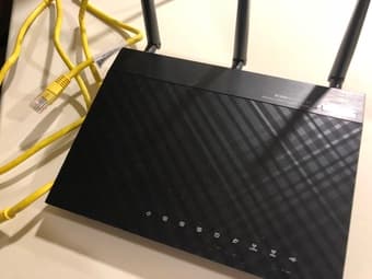 Netgear CM500 cable modem + ASUS RT-N66U wireless router 2
