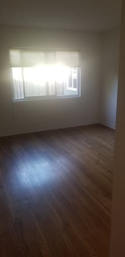 2 large, unfurnished rooms in a well-appointed, modern home 1