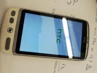 fully working HTC desire phone with loading cable 1
