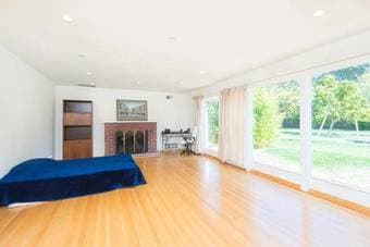 550 Square Room w/  Panoramic Floor to Ceiling Views of 1+ Acre Estate 1