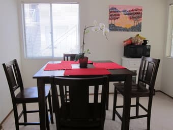 Dark brown modern dining table with 4 chairs 1