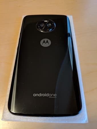 Android One Moto x4, with original charger, box, a case, and 1-2 glass 3