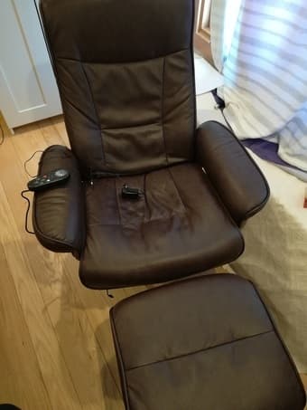 Massaging Black Leather Recliner and Ottoman with Leather Wrapped Base 1