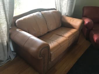 Light brown leather love seat 1