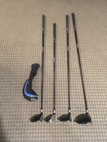 Four Golf Clubs 2