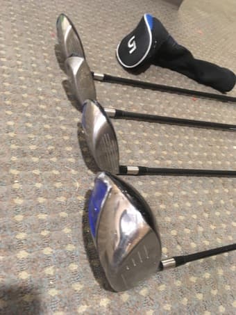 Four Golf Clubs 3