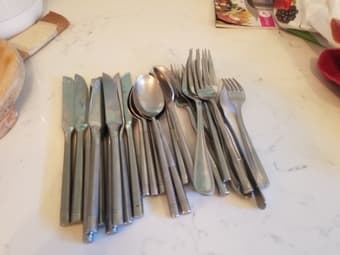 Stainless steel silverware (forks, knives, spoons) 1