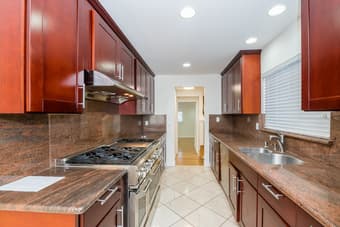 There are marble and solid hardwood flooring throughout the house. 2