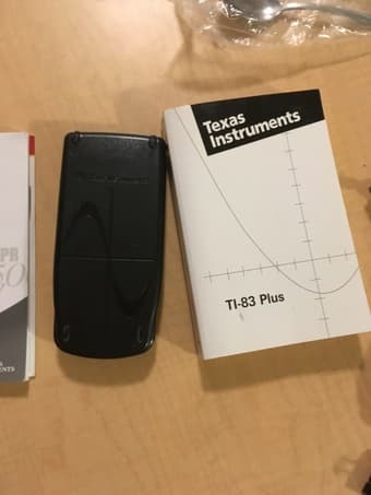 Two calculators: TI BA II Plus and TI 83 Plus 2