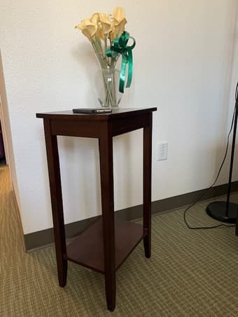 2 tier wood stand in great condition, free vases if you purchase 2