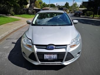 2012 Silver Ford Focus Sedan clean title - 58k miles 2