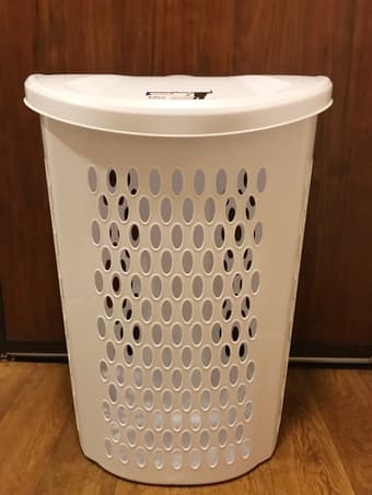 sofa, crib mattress, laundry hamper 2