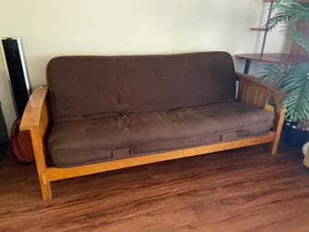 Futon convertible to comfortable queen sized bed 1