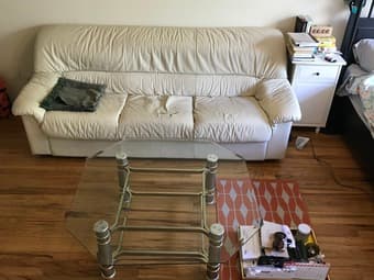 Italian leather sofa and octagon shaped glass coffee table 1