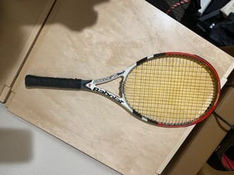 Tennis gear for $40 - 1 racquet for an adult and 1 for a kid + 6 balls 1