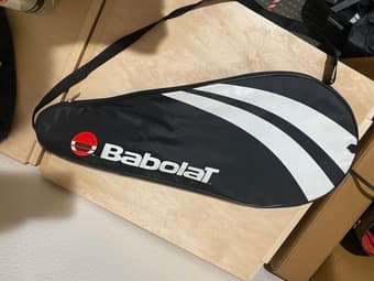 Tennis gear for $40 - 1 racquet for an adult and 1 for a kid + 6 balls 2