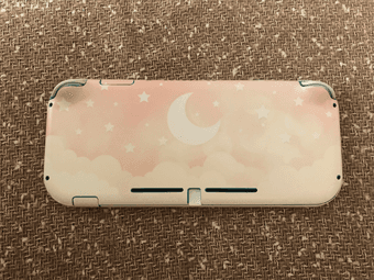 Nintendo Switch Lite Turquois with Pink Moon Skin (like new) 2