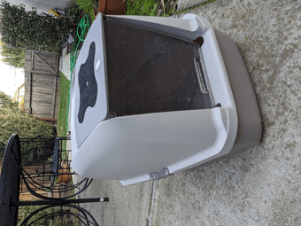 Dog crate and two cat litter boxes 1