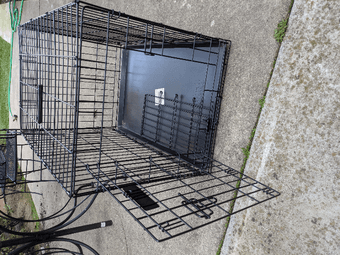Dog crate and two cat litter boxes 2