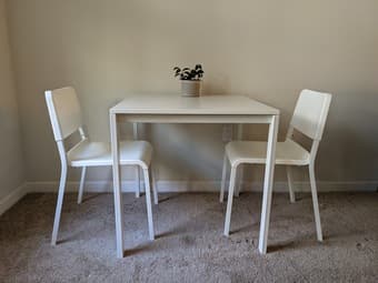 White rectangular table and two chairs 1