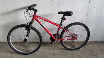Raleigh red bike 1