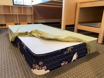 Two twin size mattresses and a bed frame 3