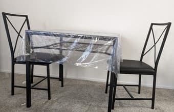 Glass-top dining table with two chairs for sale 2