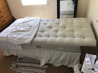 twin bed with box spring and frame. 1