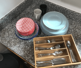 set of west elm plates, bowel and cutlery 1