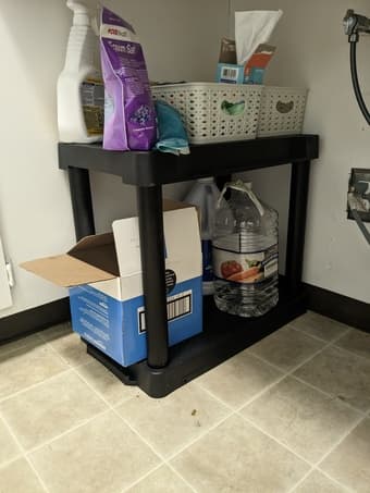 Black plastic shelf organizor 1